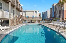Beachfront Escape: 3 Condos Steps to Fun! - Image 2