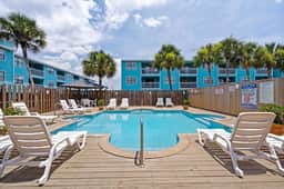 Beachfront Condo with Pool & Porch Swing - Image 3